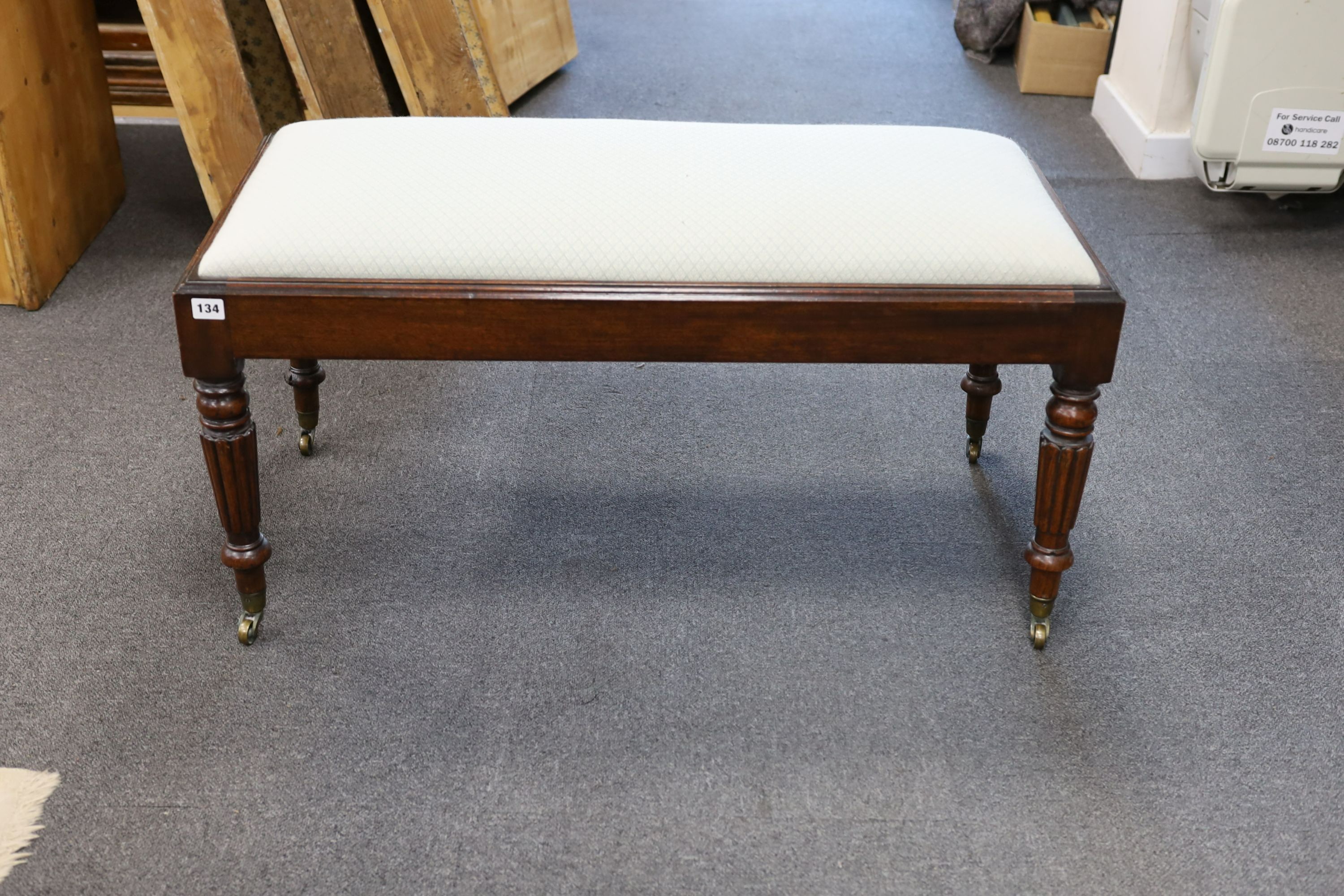 A Regency rectangular mahogany dressing stool, length 96cm, depth 46cm, height 46cm